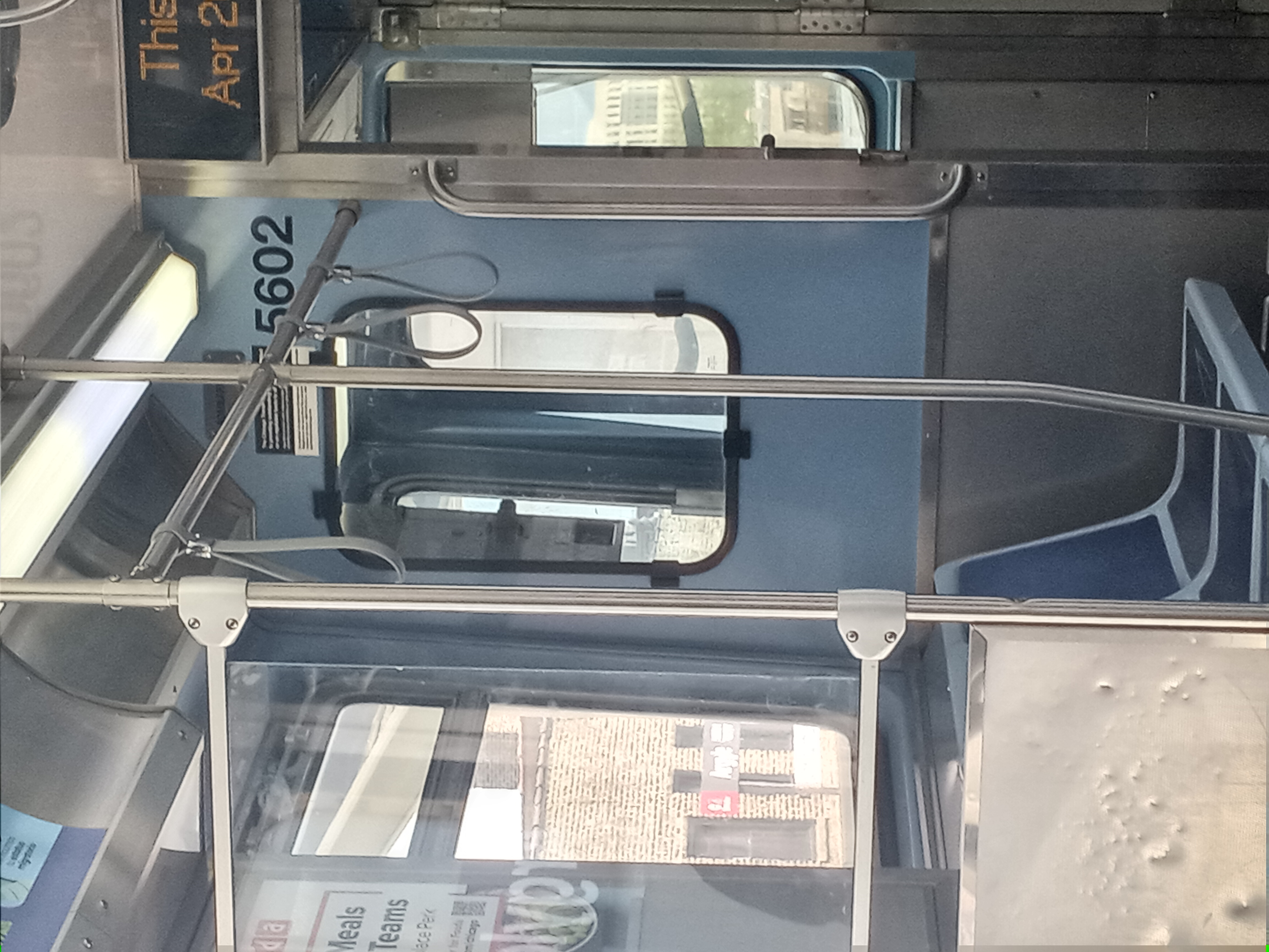 CTA train interior showing an existing car identifier and ADA-adjacent speaker area